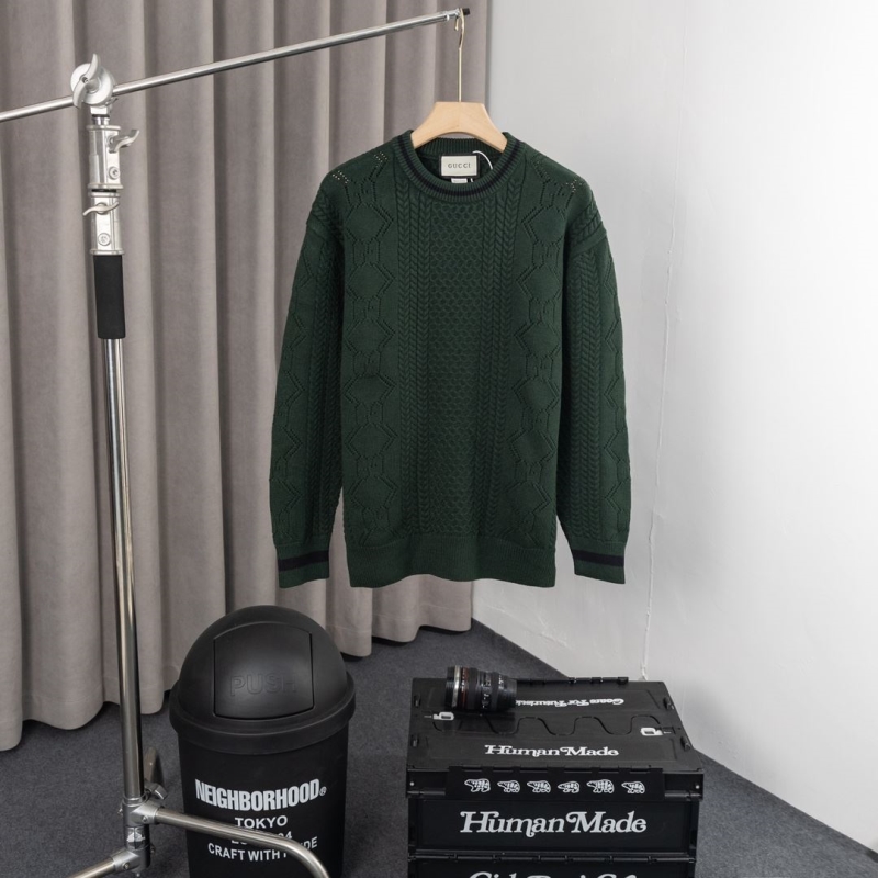 G*u*i sweaters